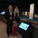 Tammy and John in front of Walter Lindrum's display area at the MCG